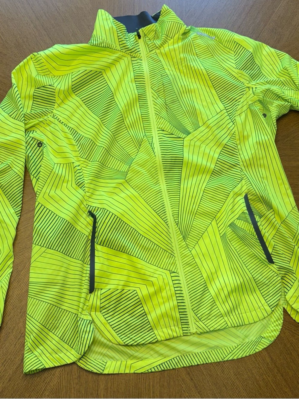 High-Visibility Neon Yellow Geometric Brooks Running Jacket